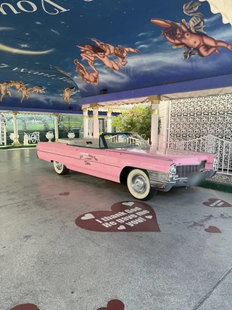 Pink Cadillac under the drive-up wedding canopy at the Little White Chapel in Las Vegas, NV